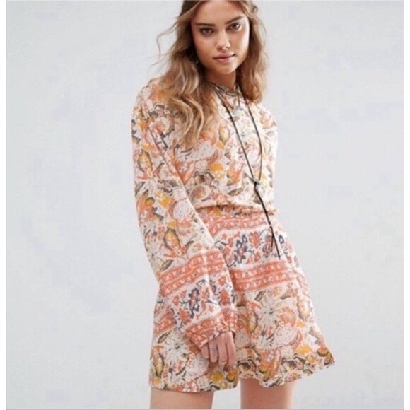 Free People Dresses & Skirts - Free People Mini Pocket Dress Sun Ruffle Printed Long Sleeve Cut Out Back Button